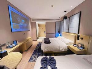 Photo de la galerie de l'établissement Echarm Hotel Wuhan High-speed Rail Peace Park Metro Station, à Wuhan