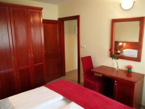 Postel nebo postele na pokoji v ubytování Apartments Vila Kristina