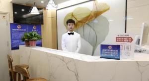 Členové personálu v ubytování Green Tree Inn Express Beijing Xicheng District Dazhalan