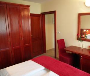 Postel nebo postele na pokoji v ubytování Apartments Vila Kristina