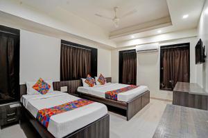 Ένα ή περισσότερα κρεβάτια σε δωμάτιο στο Via Shahi Villa