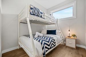 Postel nebo postele na pokoji v ubytování The Herron Rise Retreat