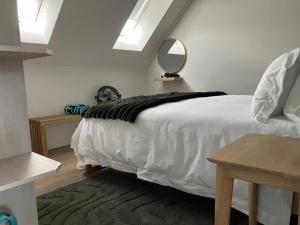 Ένα ή περισσότερα κρεβάτια σε δωμάτιο στο The Wild Oak