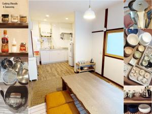 Zimmer mit einer Küche mit einem Tisch. in der Unterkunft 亀のや in Tokio