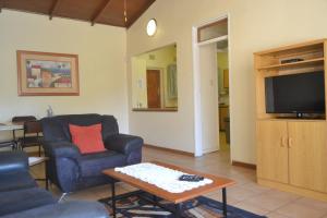 Televisyen dan/atau pusat hiburan di Hadida Guest House