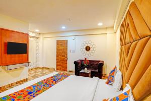 Ένα ή περισσότερα κρεβάτια σε δωμάτιο στο Hotel Nandlala Stays +18 φωτογραφίες