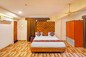 Ένα ή περισσότερα κρεβάτια σε δωμάτιο στο Hotel Nandlala Stays