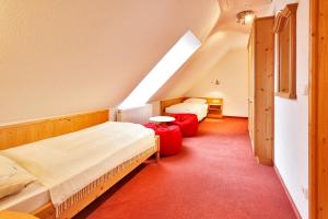 Ένα ή περισσότερα κρεβάτια σε δωμάτιο στο Pension Waldwinkel