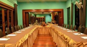 a large long table in a room with chairs at Khao Yai Paradise on Earth in Ban Bung Toei +282 photos