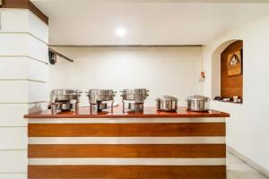 Kuchyň nebo kuchyňský kout v ubytování Treebo Sam Residency