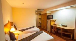 TV a/nebo společenská místnost v ubytování NH Elegant Hotel