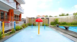 Ο χώρος παιχνιδιού για παιδιά στο Umah Bali Suites