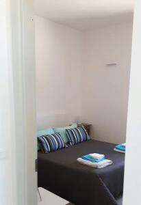 A bed or beds in a room at Agriturismo Casebianche