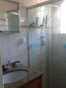 Um banheiro em Pousada Recanto das Águas mais 37 fotos