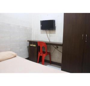 TV a/nebo společenská místnost v ubytování Hotel O Bontotangnga Homestay + 45 fotografií