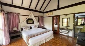 Ένα ή περισσότερα κρεβάτια σε δωμάτιο στο Phuingfah