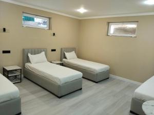 Ένα ή περισσότερα κρεβάτια σε δωμάτιο στο Hotel S & D Hostel