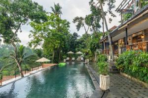 Πισίνα στο ή κοντά στο Amora Ubud Boutique Villas