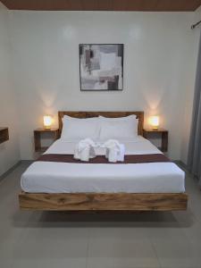 Postel nebo postele na pokoji v ubytování Emman's Guest House