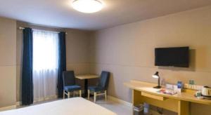 Μια τηλεόραση ή/και κέντρο ψυχαγωγίας στο Jinjiang Inn (Hankou Railway Station)