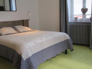 Postel nebo postele na pokoji v ubytování Guesthouse Le Vauban