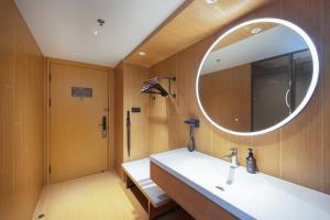 Koupelna v ubytování JI Hotel Shenzhen Guanlan Huawei Jiulongshan + 17 fotografií