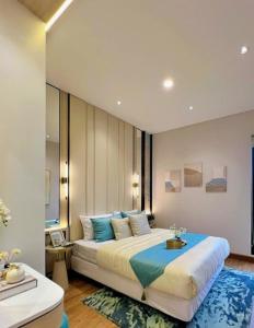 Ένα ή περισσότερα κρεβάτια σε δωμάτιο στο HomeStay Bangau