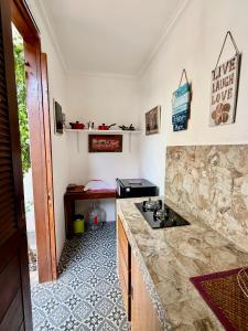 Η κουζίνα ή μικρή κουζίνα στο Casa Sophia by Kayana +29 φωτογραφίες