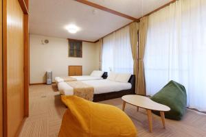 Postel nebo postele na pokoji v ubytování 和がと Wagato Kawaguchiko