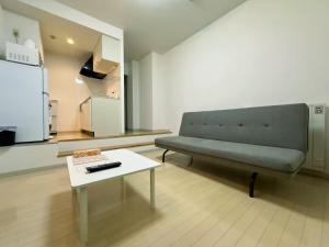 Χώρος καθιστικού στο 411札幌駅7分と大通駅徒歩6分で好立地な都心を満喫でき綺麗な部屋で快適が生活が実現