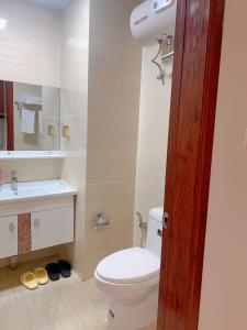 Koupelna v ubytování 晨曦公寓酒店