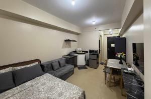 Una cocina o cocineta en CDO City Center Avida Condo Fast Wifi 3 fotos más