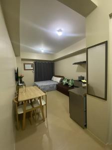 Una cocina o cocineta en CDO City Center Avida Condo Fast Wifi