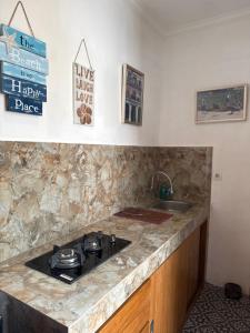 Η κουζίνα ή μικρή κουζίνα στο Casa Sophia by Kayana