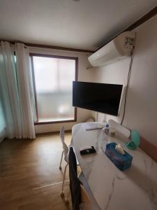 Et tv og/eller underholdning på 러너리 스테이