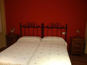 A bed or beds in a room at El Molin de Eloy