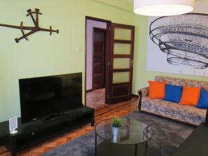 Posedenie v ubytovaní Porto 3 Bedroom Beach Apartment