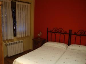 A bed or beds in a room at El Molin de Eloy
