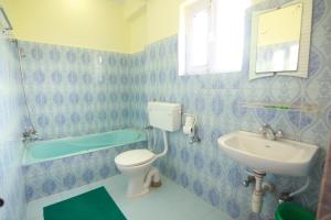 Ванна кімната в Hotel Himalayan Inn