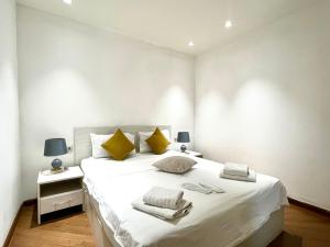 Ένα ή περισσότερα κρεβάτια σε δωμάτιο στο Apricot inn apartments