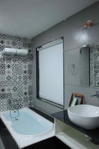 Ένα μπάνιο στο Sai Dhara Resort