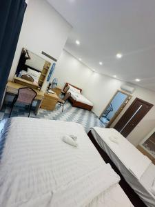 Ένα ή περισσότερα κρεβάτια σε δωμάτιο στο La Maison De DiNo