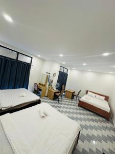 Ένα ή περισσότερα κρεβάτια σε δωμάτιο στο La Maison De DiNo