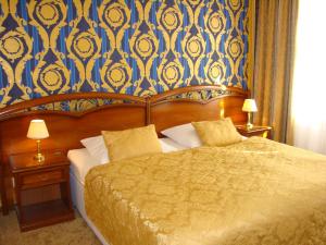 Posteľ alebo postele v izbe v ubytovaní Hotel Saint Petersburg