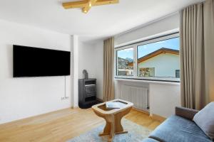 TV a/nebo společenská místnost v ubytování Apt Hofer Monika