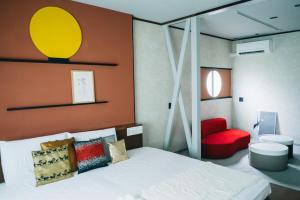 Postel nebo postele na pokoji v ubytování Doa Doa