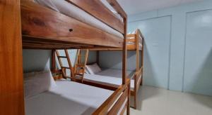 Postel nebo postele na pokoji v ubytování Yemaya de Laiya powered by Cocotel + 165 fotografií