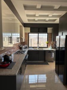 Kuchyň nebo kuchyňský kout v ubytování Sport city