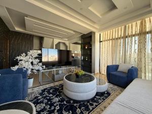 TV a/nebo společenská místnost v ubytování Sport city