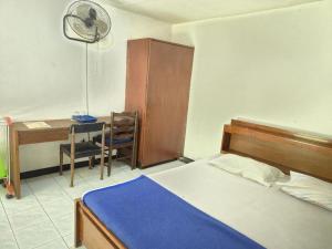 Postel nebo postele na pokoji v ubytování Capital O 94094 New Lembah Nyiur + 53 fotografií